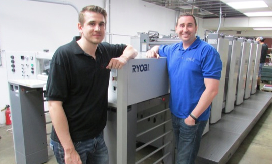 (From left) Kyl and Ty Blankenship. The brothers' father, Franko, founded the print firm in 1983.